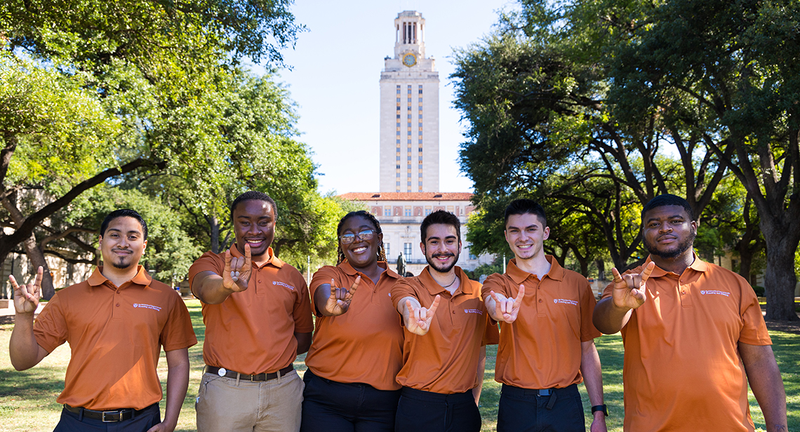Image of UT Students behind of the tower 