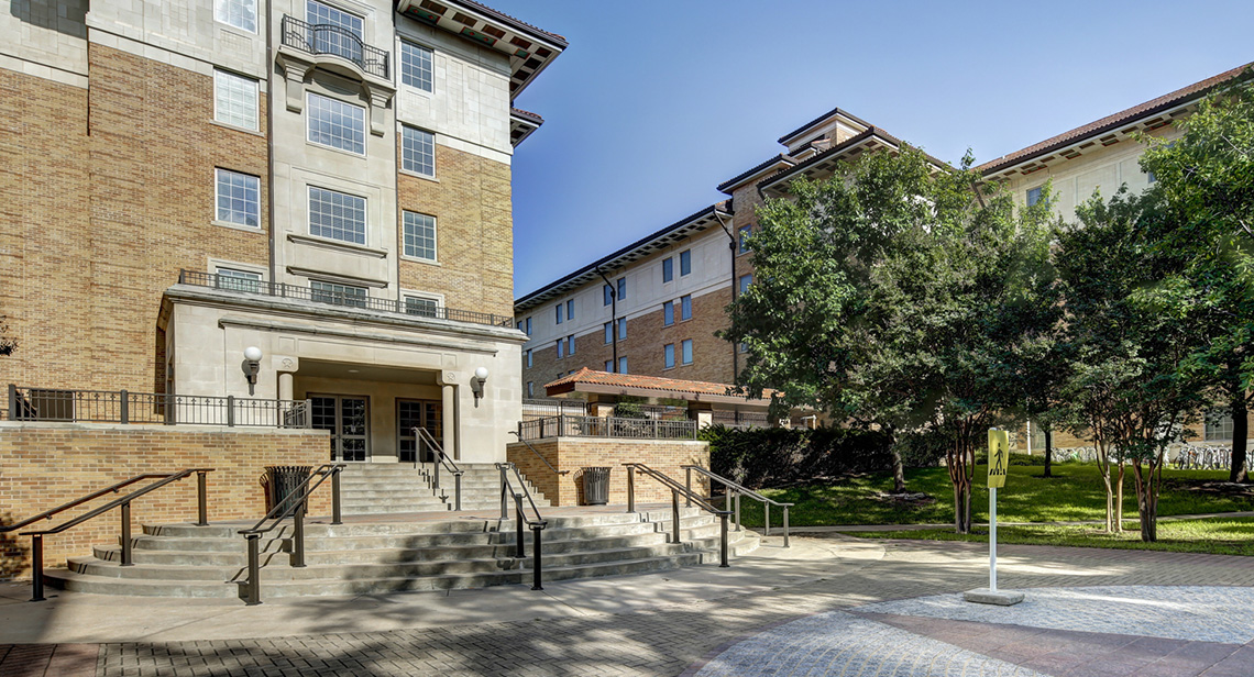 Exterior view of the East-side entrance of San Jacinto Residence Hall