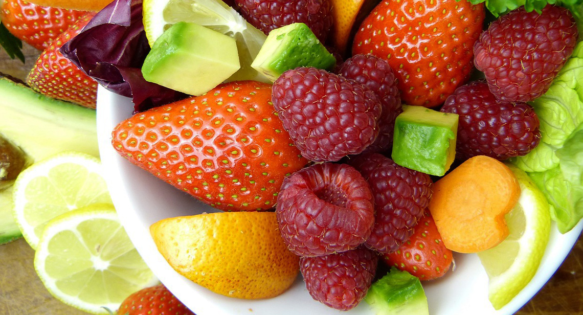 An assortment of fruit displayed in a bowl.