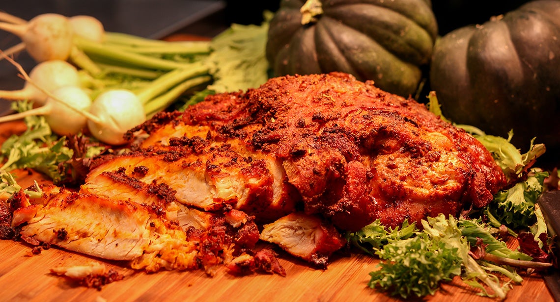 Prepared meat and various vegetables on display