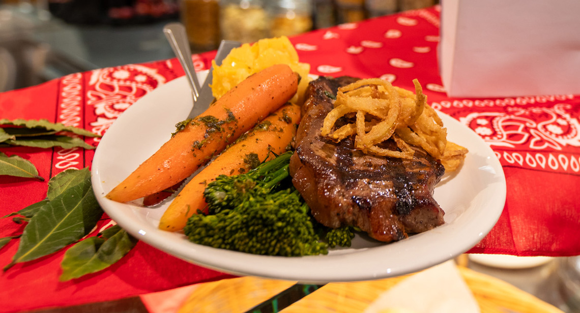 A view of steak and various vegetables on display at the Steak Night event