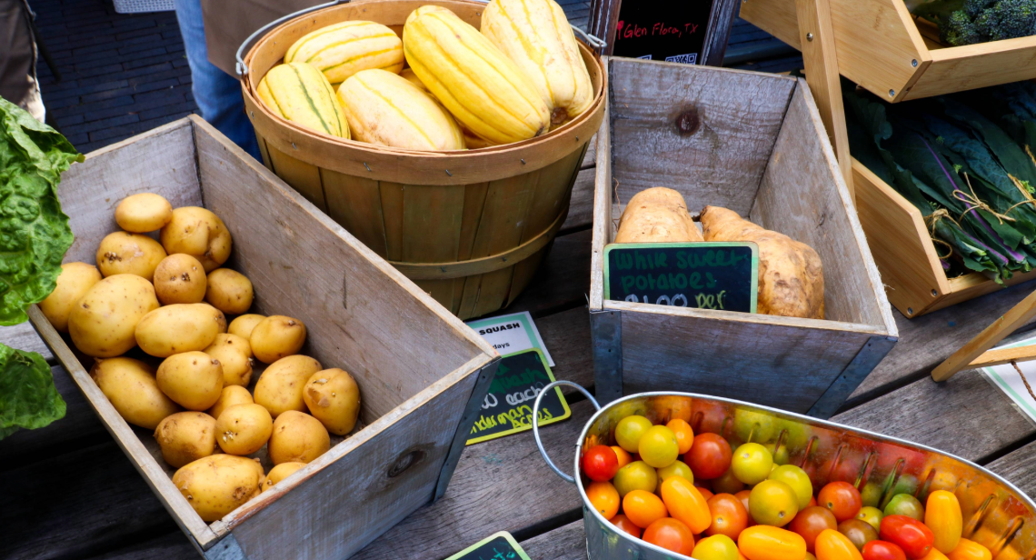 An assortment of potatoes, squash and grape tomatoes at UT Farm Stand. 