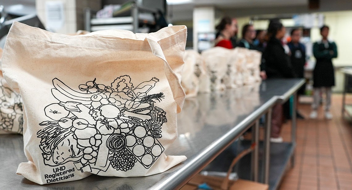 UHD registered dietitians tote bag with illustrations of fruits and vegetables