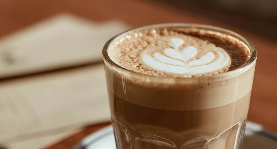  A close up of latte cup on a table
