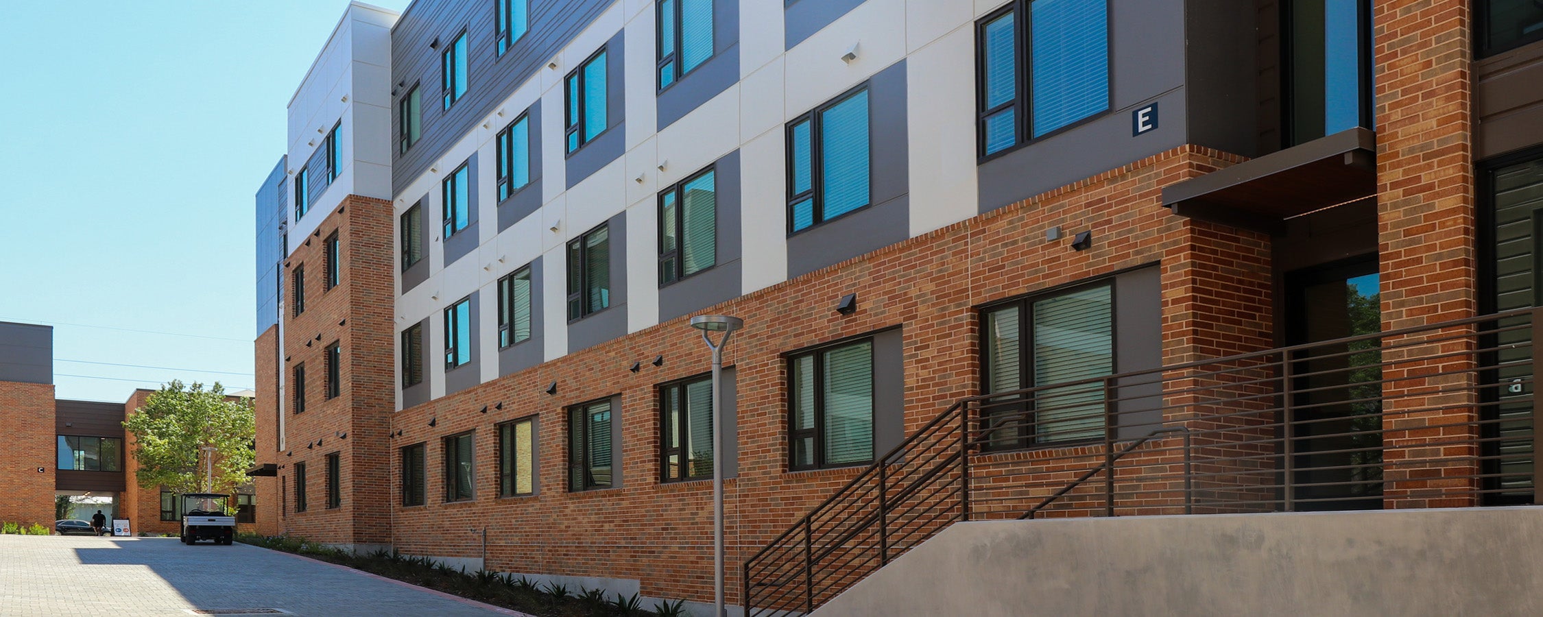  A view of Building E’s west front stair entrance at East Campus Graduate Apartments