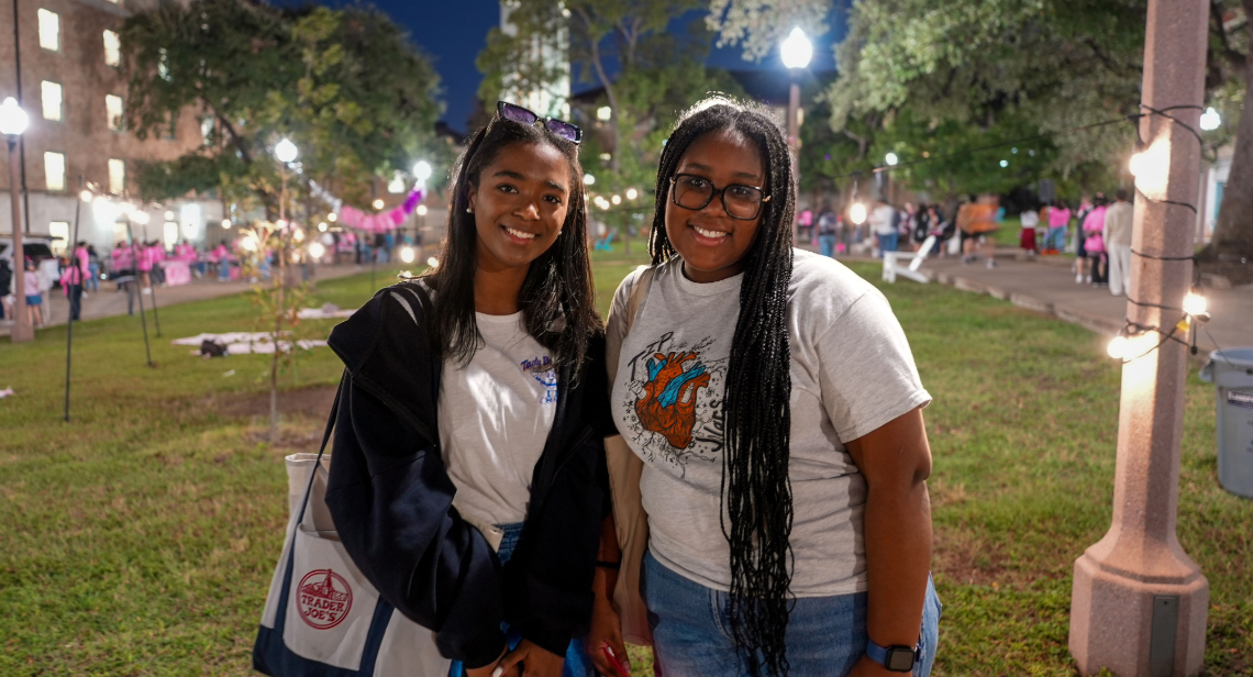 Two UT students in the Quad Courtyard