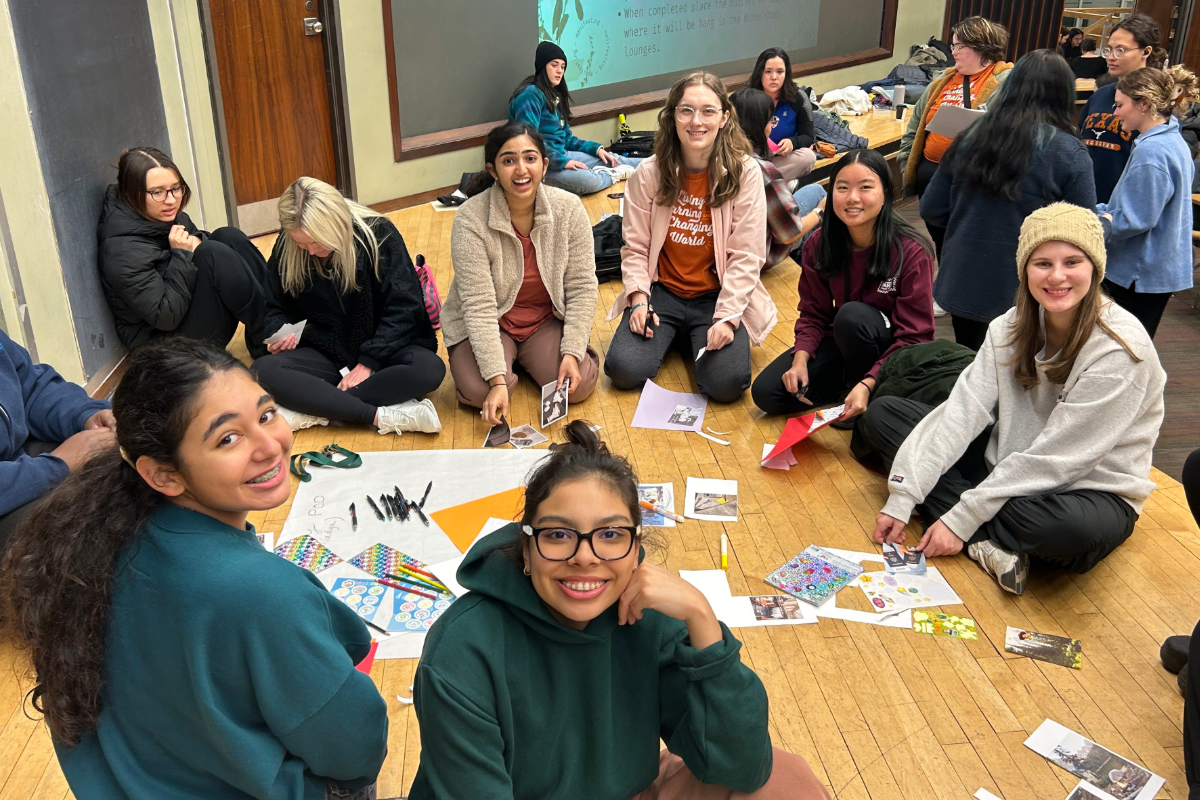 Group of UT students participating in a scrapbooking activity at an LLC event