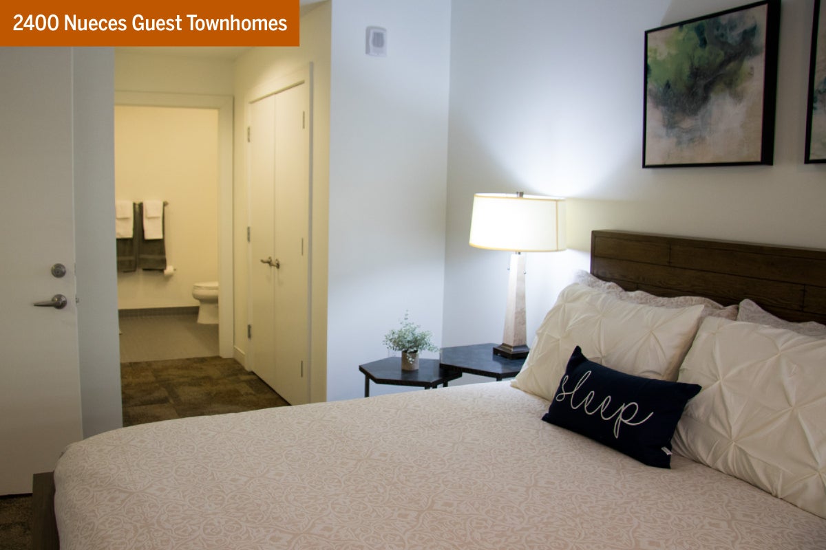 A bedroom in a 2400 Nueces Guest Townhome
