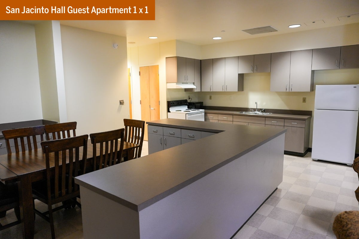 The kitchen in a one bedroom one bathroom San Jacinto Hall Guest Apartment