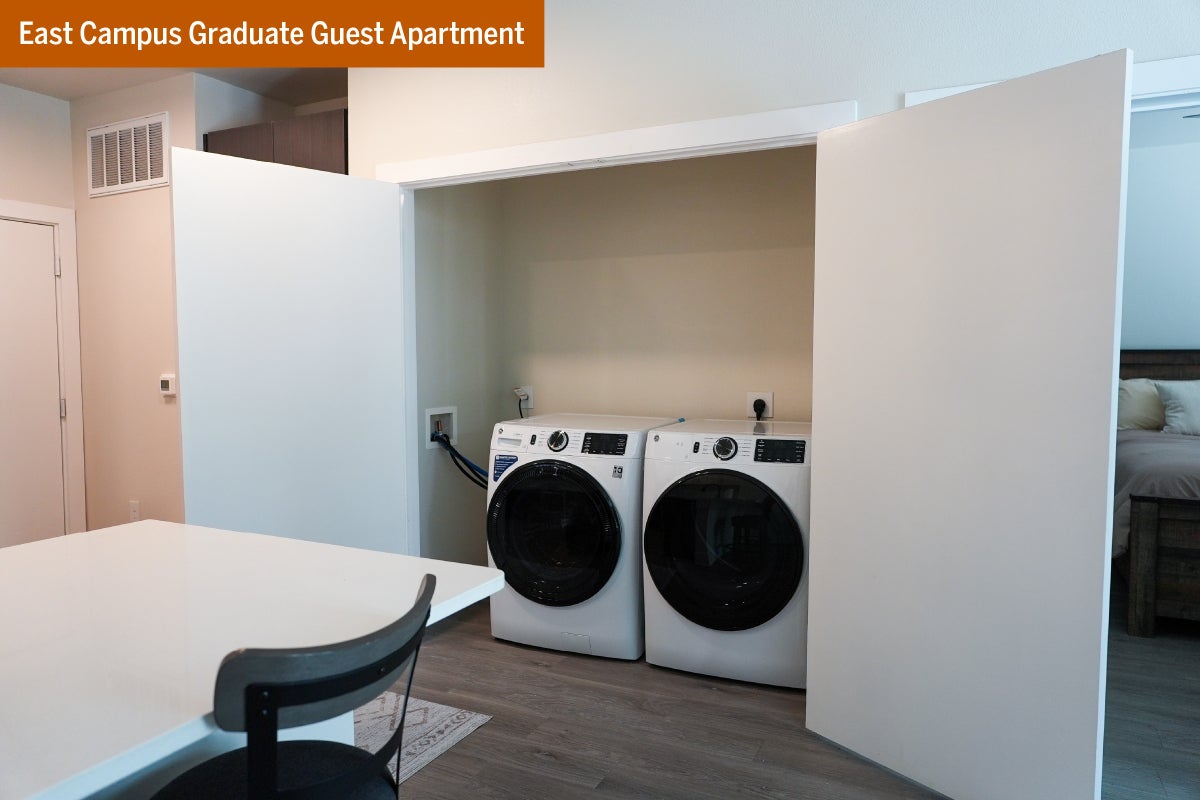 A washer and dryer in a laundry closet in an East Campus Graduate Guest Apartment