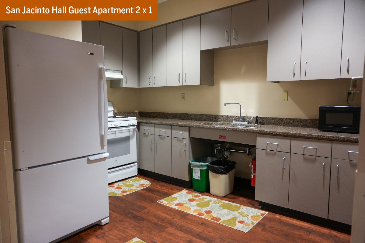 The kitchen in a two bedroom one bathroom San Jacinto Hall Guest Apartment