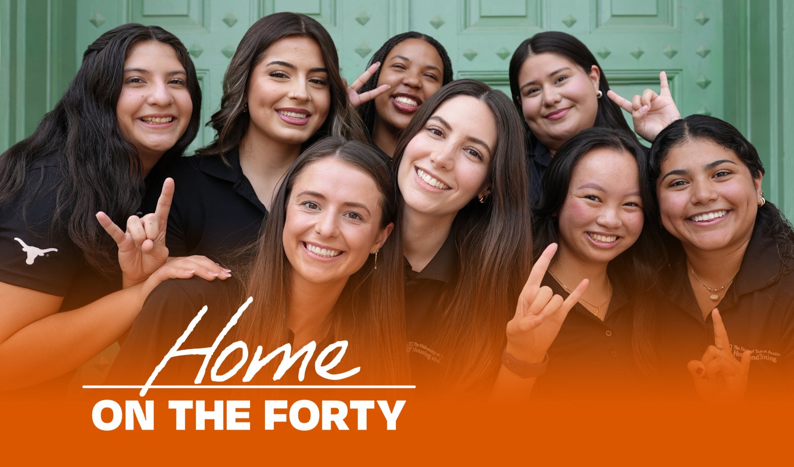 Student posing with a Hook ‘em hand sign inside of Kins Dining