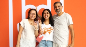 UT student with her parents during Move In
