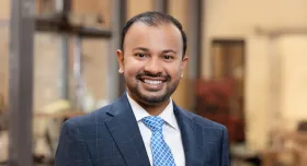 Alt text: Headshot of UT Austin faculty member Dr. Justin Samuel.