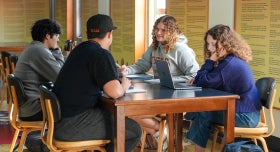 A group of UT students study together in Jester West Hall