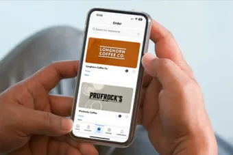 A UT student views the GET™ app on a smartphone