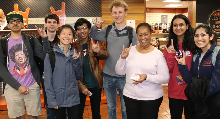 Dr. Tyus with students Get to know Dr. Tyus