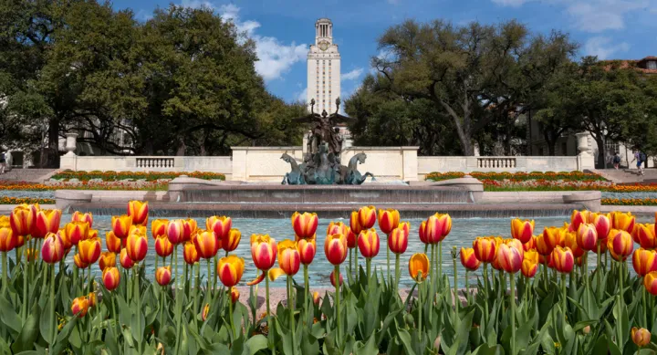 The Littlefield Fountain at the University of Texas at Austin with the Clock Tower behind it